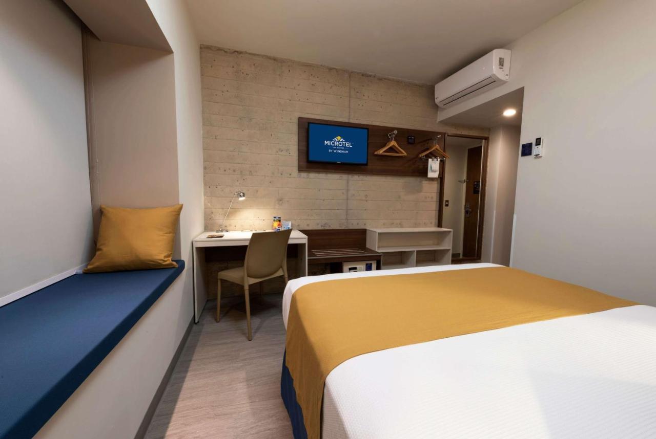 Microtel Inn & Suites By Wyndham Guadalajara Sur Palomar Extérieur photo